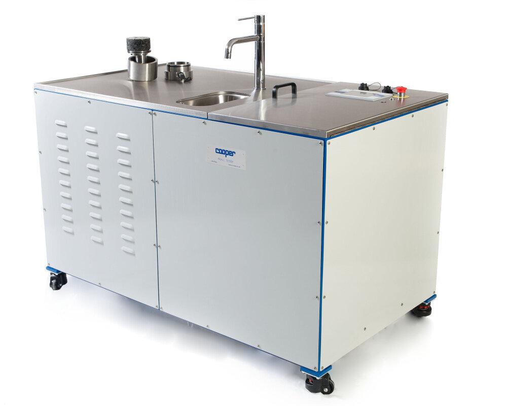 Image of Cooper Prall tester used for accurate abrasion resistance testing of asphalt.