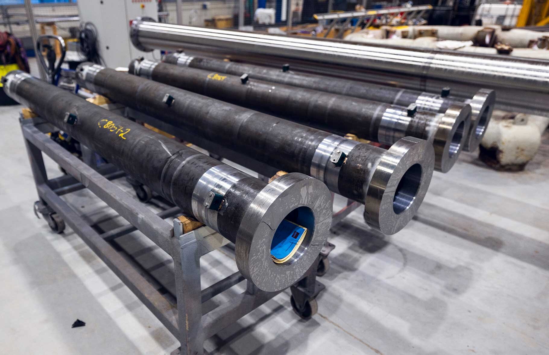 Tension cylinders in the workshop, ready for installation in offshore applications