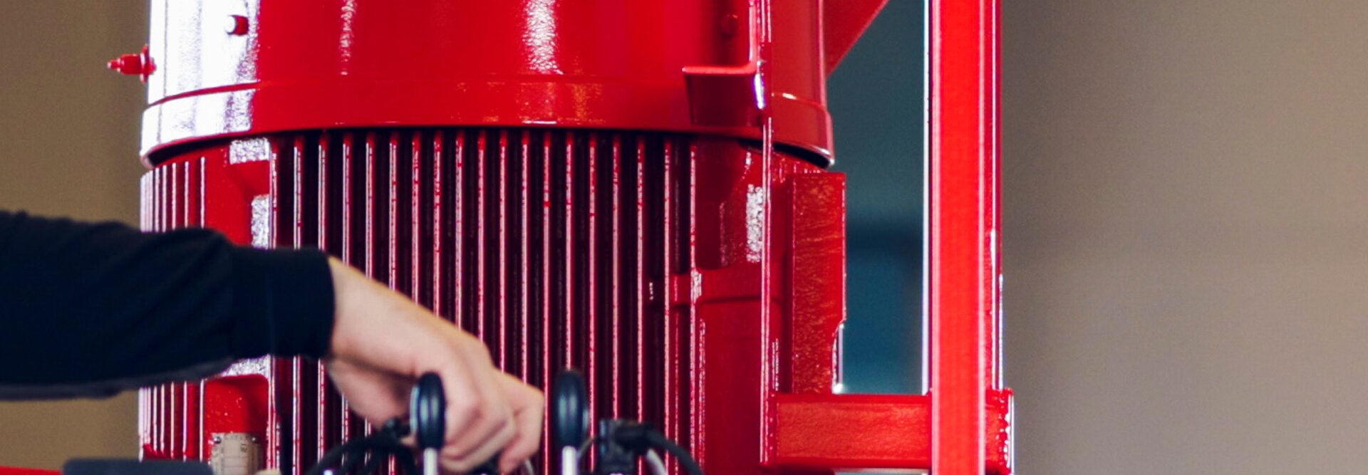 close up image of hydraulic power unit in red coating